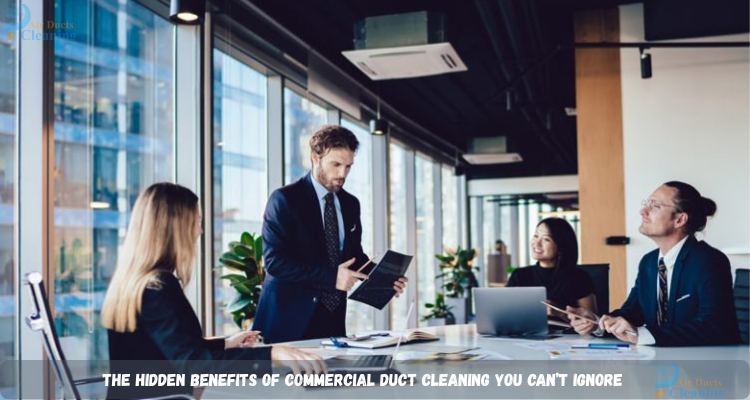 people are working happily in the office with their commercial duct